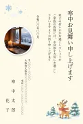 写真入り・丸い写真枠と雪の森のトナカイのクレヨン画デザイン